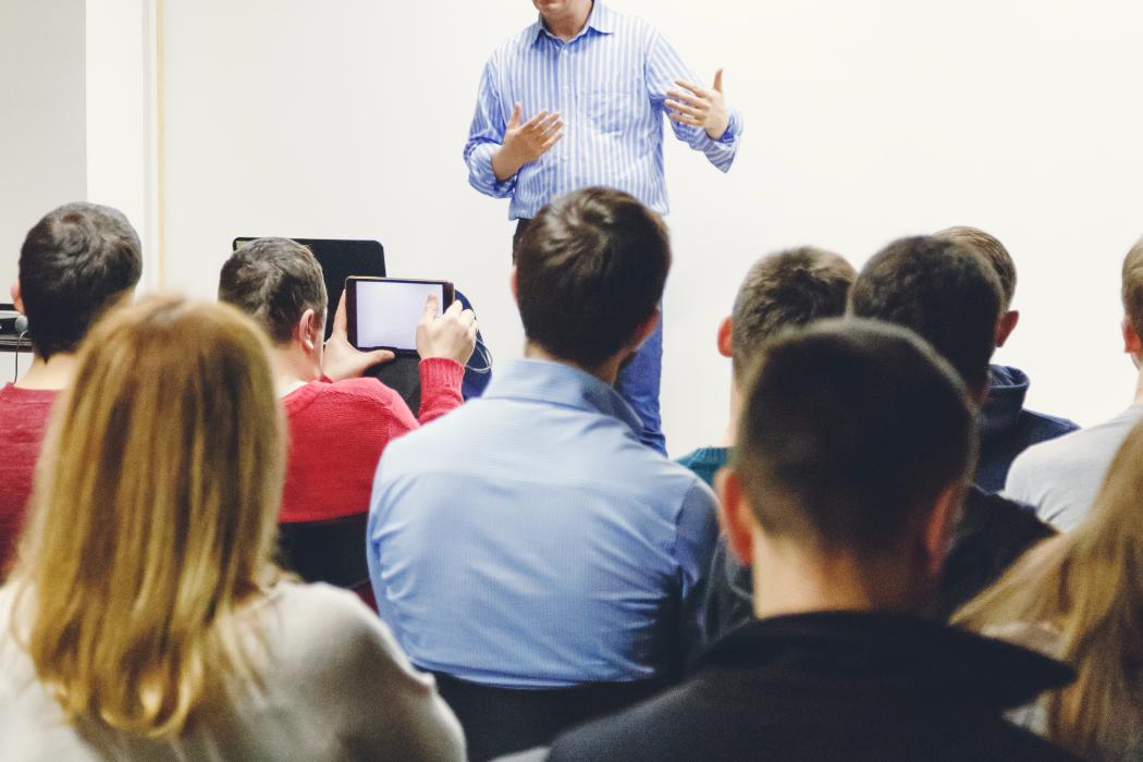 lecturer demonstrating in front of a class